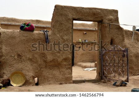 close up view of Entry door of a mud made village hut madeup of clay