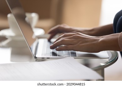 Close up view female hands typing on laptop. Lead correspondence to client remotely via e-mail app on laptop. Telework activity, writer create article, browse internet use modern wireless tech concept - Shutterstock ID 2029044815