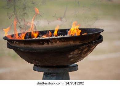 Close up view of flame lit at start of sports day event