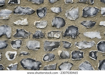 Close up view of a flint stone wall