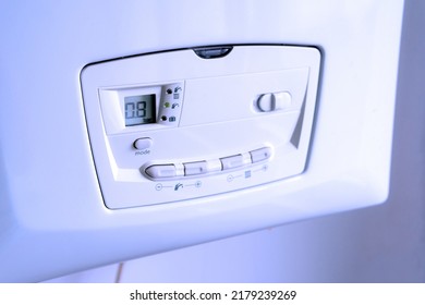 Close Up View Of A Gas Heating Boiler For Home In Cold Tones. Control Panel.