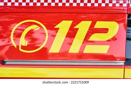 Close up view of German fire department emergency number 112 on fire truck to call for help in case of fire or accident - Powered by Shutterstock