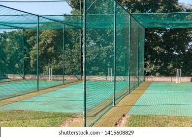 A close up view of a grass practice cricket nets  - Shutterstock ID 1415608829