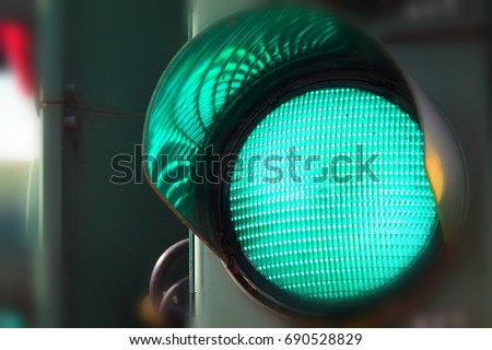 Close up view of green color on the traffic light.