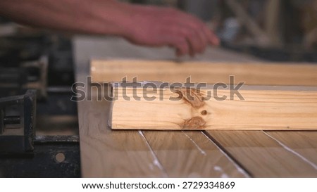 Close View Of Hands Organizing Completed Wood Panels On Production Conveyor Belt For Transporting. Media