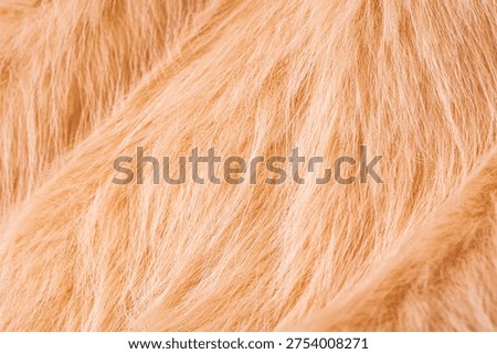 Close up view of incredibly soft light brown fluffy warm wool fabric texture background pattern