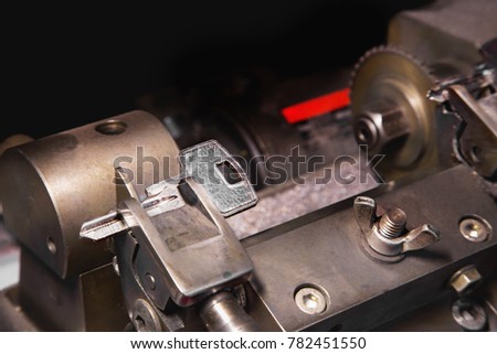 Close view of key copying machine with keys