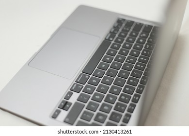 Close Up View Of A Laptop On A The Desk, Shallow Depth Of Field