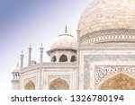 A close up view of the left side of the front of the Taj Mahal.