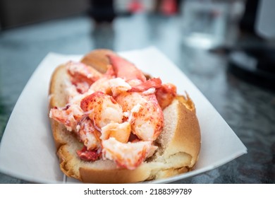 Close up view of a lobster roll with butter - Shutterstock ID 2188399789