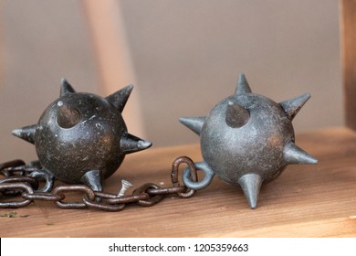 Close Up View Of A Medieval Flail With Spiked Balls.