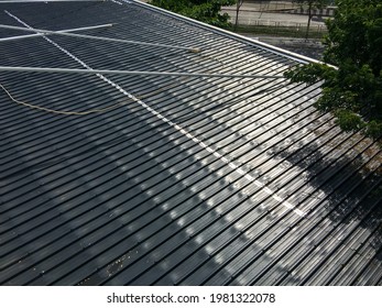 Close Up View Of Metal Sheet Roof With Tension Rod Structure