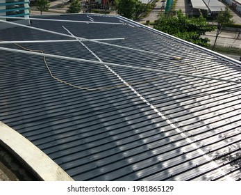 Close Up View Of Metal Sheet Roof With Tension Rod Structure