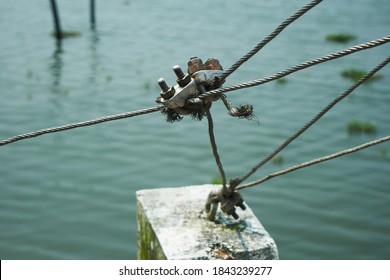 Close Up View Of Metalic Rope Interconction On River Side Rope Bridge,selective Focus