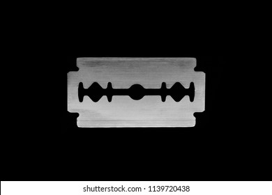 Close Up View Of Metallic Razor Blade Isolated On Black Background Surface