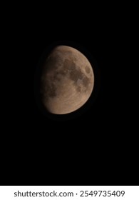 close up view of the moon at night without clouds and stars