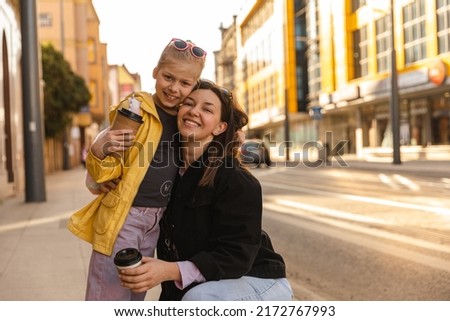 Similar – Image, Stock Photo Twin sisters look around in an alleyway