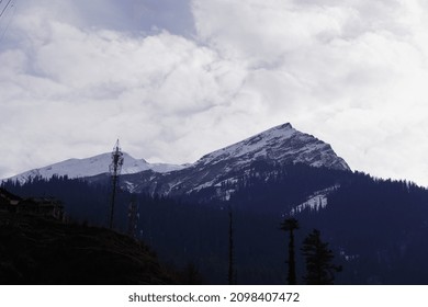Close view of mountain with clouds