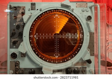 Close view of a naval radar screen preserved as a museum display inside HMS Belfast in London, England.