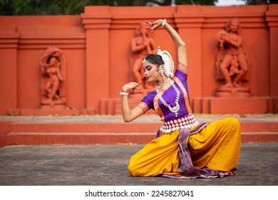 Close up view of ndian girl dancer of Indian classical dance form Odissi. Culture and traditions of India. - Shutterstock ID 2245827041