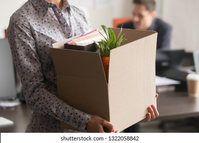 Close Up View Of New Female Employee Intern Holding Cardboard Box With Belongings Start Finish Job In Company Office, Busnesswoman Newcomer Worker Get Hired Fired On First Last Day At Work Concept