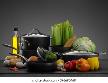 close up view nice cookware set and some vegetables grey back