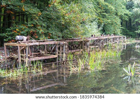 Close up view of a number of defunct wave machines in Waterloopbos of Natuur Monumenten in Marknesse, the Netherlands, former hydrological laboratory