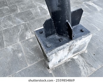 close up view of nut and blot of which can fix a steel column with a concrete base