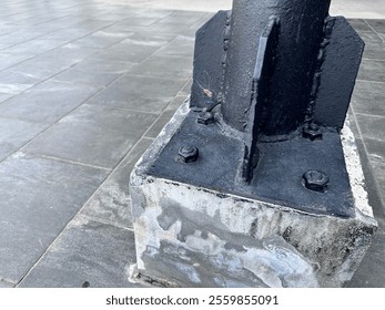 close up view of nut and blot of which can fix a steel column with a concrete base