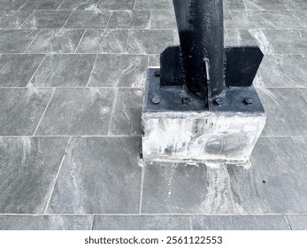 close up view of nut and blot of which can fix a steel column with a concrete base