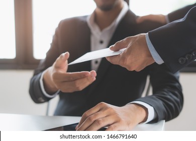 Close up view of  office worker receiving salary from boss. - Shutterstock ID 1466791640