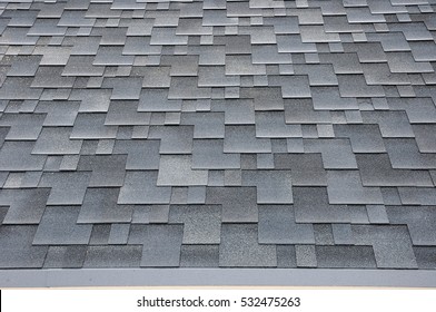 Close up view on asphalt roofing shingles 
