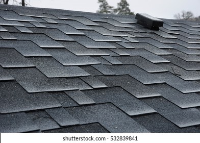 Close Up View On Asphalt Roofing Shingles 