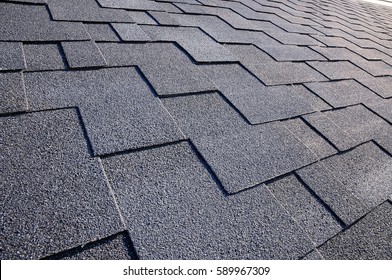 Close Up View On Asphalt Roofing Shingles Background.