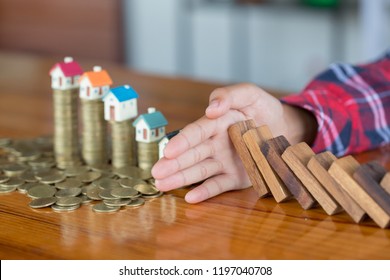 Close Up View On Hand Of Business Woman Stopping Falling Blocks On Table For Concept About Taking Responsibility, Problem Solving, Risk Control Concept