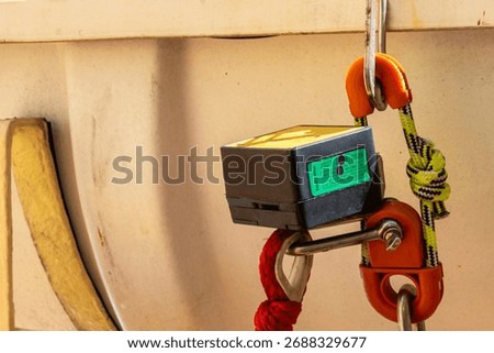 Close view on the hydrostatic release unit for a ship's life raft.