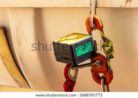 Close view on the hydrostatic release unit for a ship's life raft.