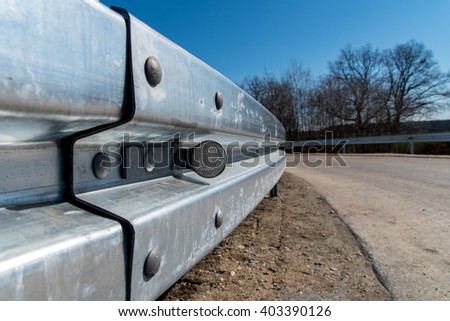 Close view on the metal railing on the route