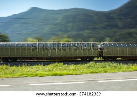 Close view on the modern train going fast in the mountains Stock photo © 