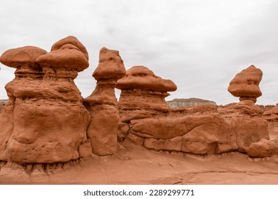 Close up view on unique eroded Hoodoo Rock Formations at Goblin Valley State Park in Utah, USA, America. Sandstone rocks called goblins which are mushroom-shaped rock pinnacles. Overcast day in summer - Shutterstock ID 2289299771