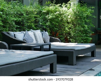 close up view of outdoor daybed on terrace wood