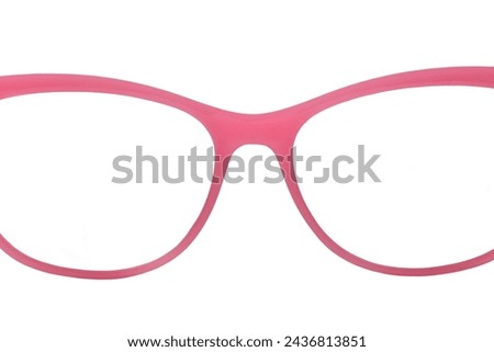 Close up view of a pair of galsses with pink plastic frames isolated on a plain white background. Copy space.
