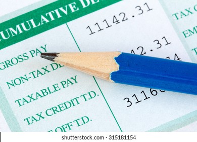 Close Up View Of Pencil And Wage Slip