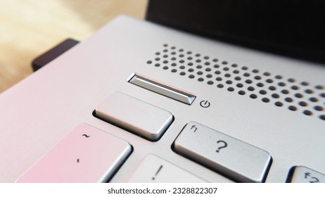Close up view of power button on computer laptop