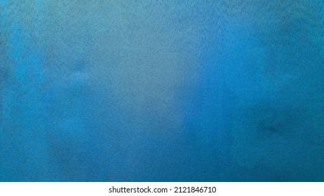 Close Up View Of Real Blue Screen Background In Film Studio. Blue Velvet Fabric Background. Real Blue Screen For Stock Footage Video.