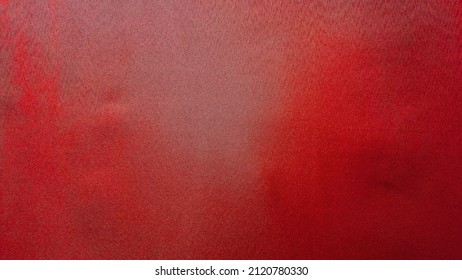 Close Up View Of Real Red Screen Background. Red Velvet Fabric Background. Real Red Screen For Stock Footage Video. Red Cloth. Fabric Surface For Banner Background.