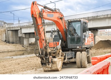 close up view of red backhoe