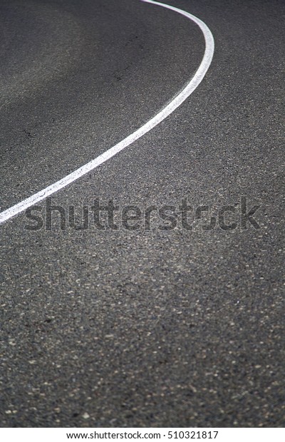 Close view of the
road lane with a white
line