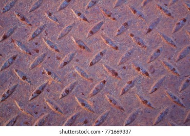 Close Up View Of Rusted Diamond Plate Steel 