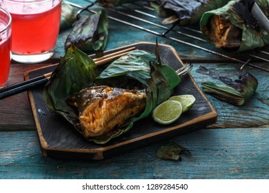 Close View Of Sambal Stingray Or Malaysian Grilled Stingray Wings In A Leaf